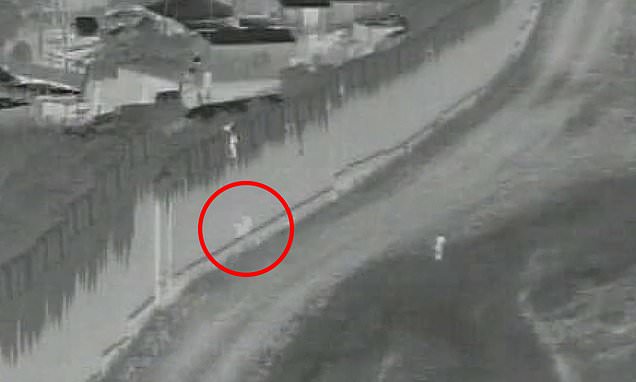 Featured image for Shocking Video Shows 4-Year-Old Migrant Boy Dumped Over US-Mexico Border Fence