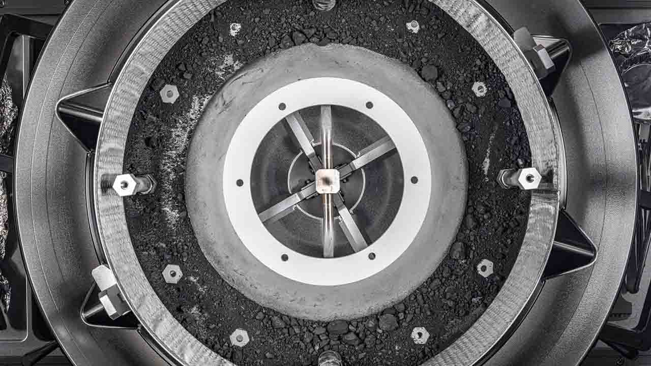 Featured image for "NASA Unveils Contents of Freed Asteroid Sample Canister"