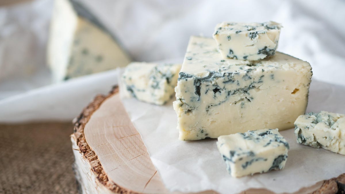 Featured image for "Researchers Uncover Method to Transform Blue Cheese into Pink Delicacy"