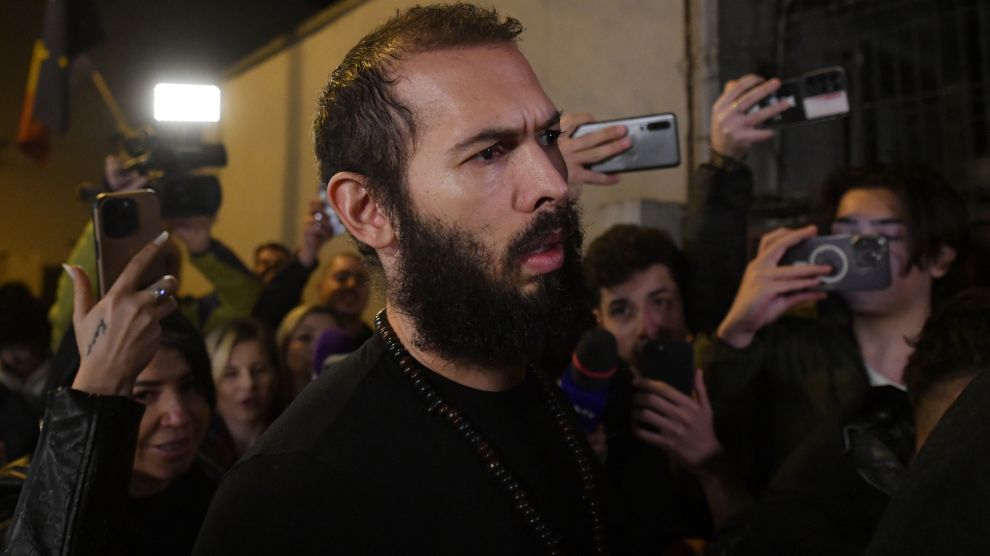 Andrew Tate's detention changed to house arrest in Romania.