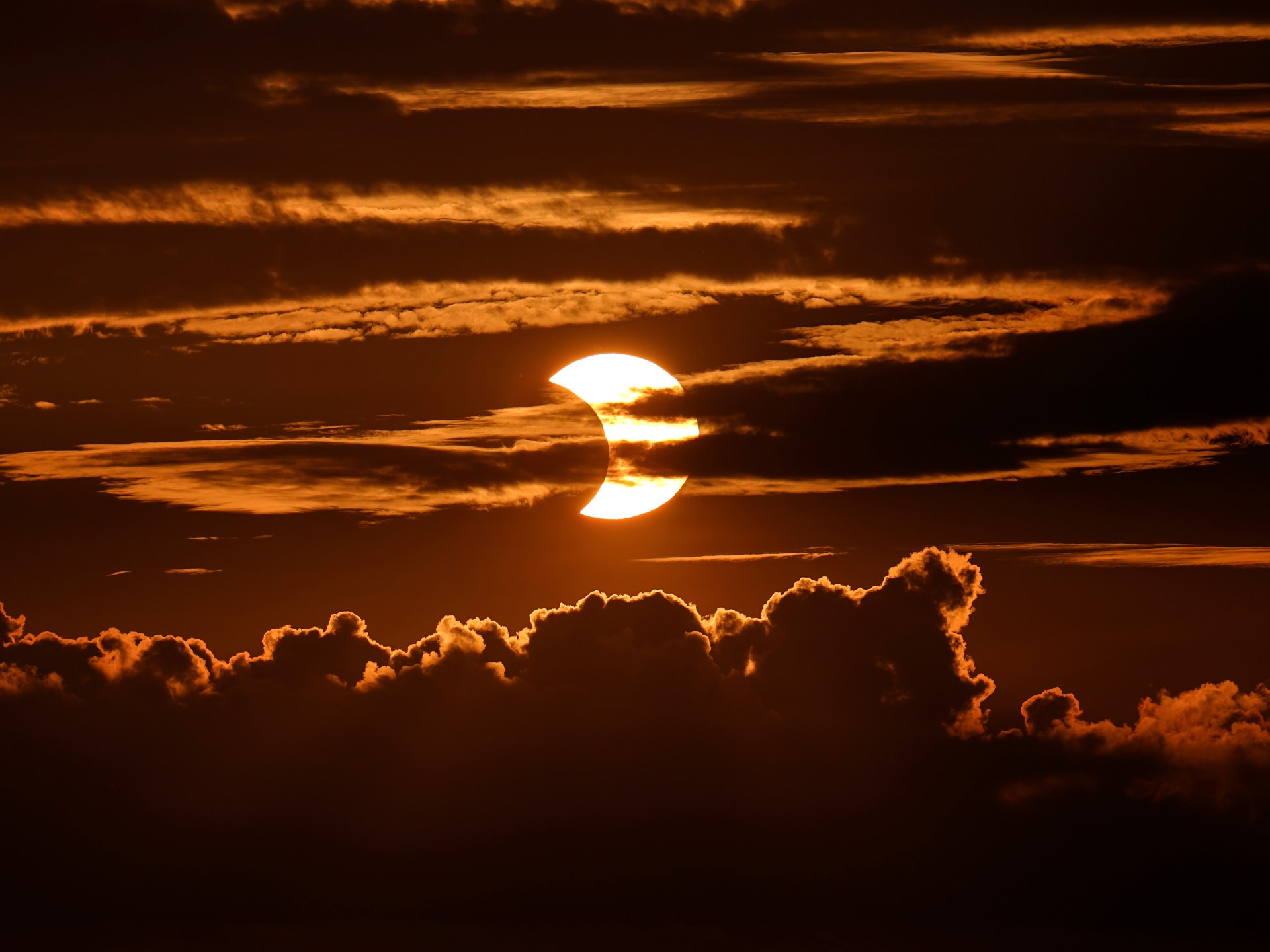 Featured image for Your Guide to Viewing the Rare Hybrid Solar Eclipse This Week