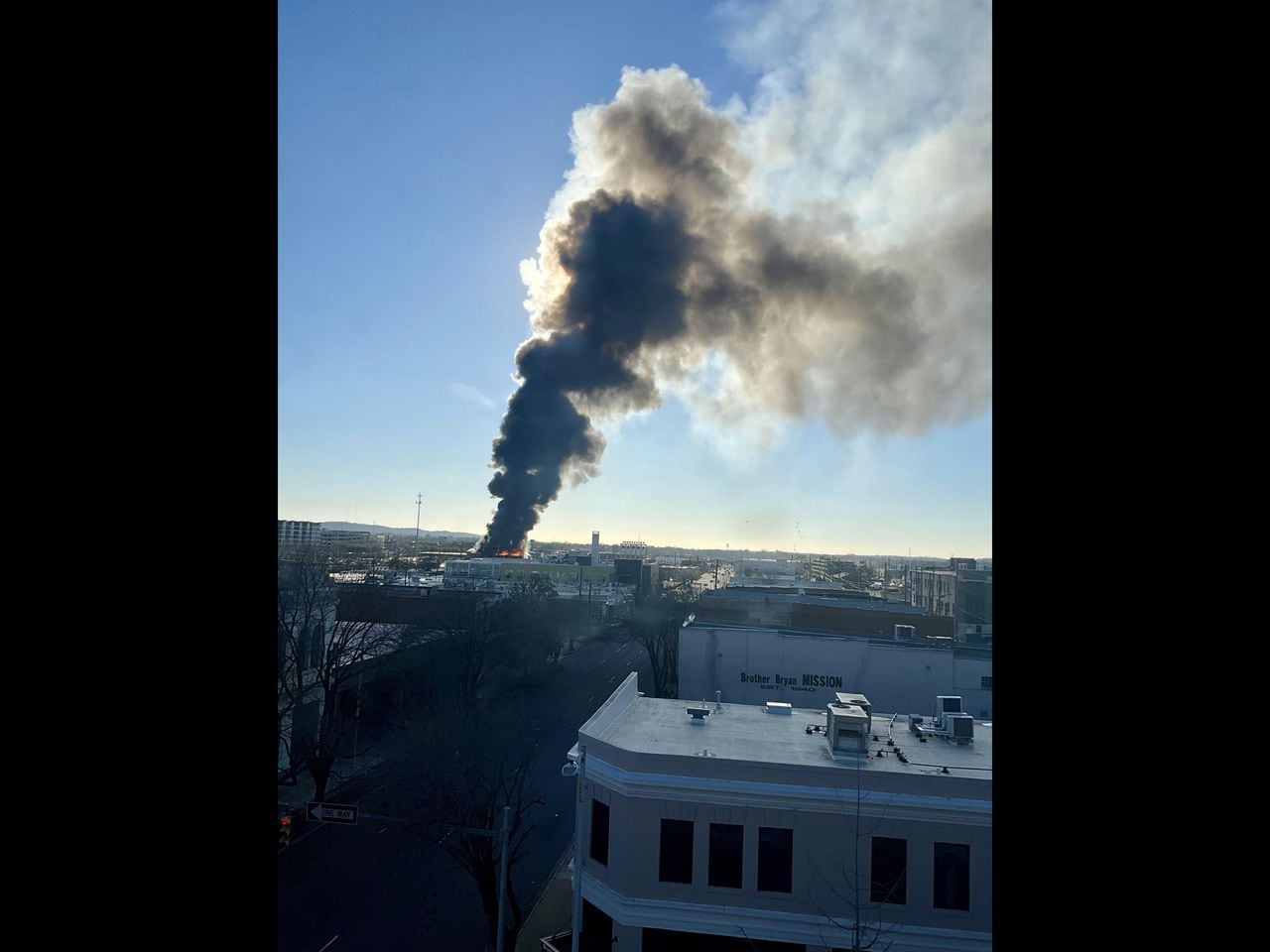 "Vacant Birmingham Building Engulfed in Flames, Sending Smoke Over City"