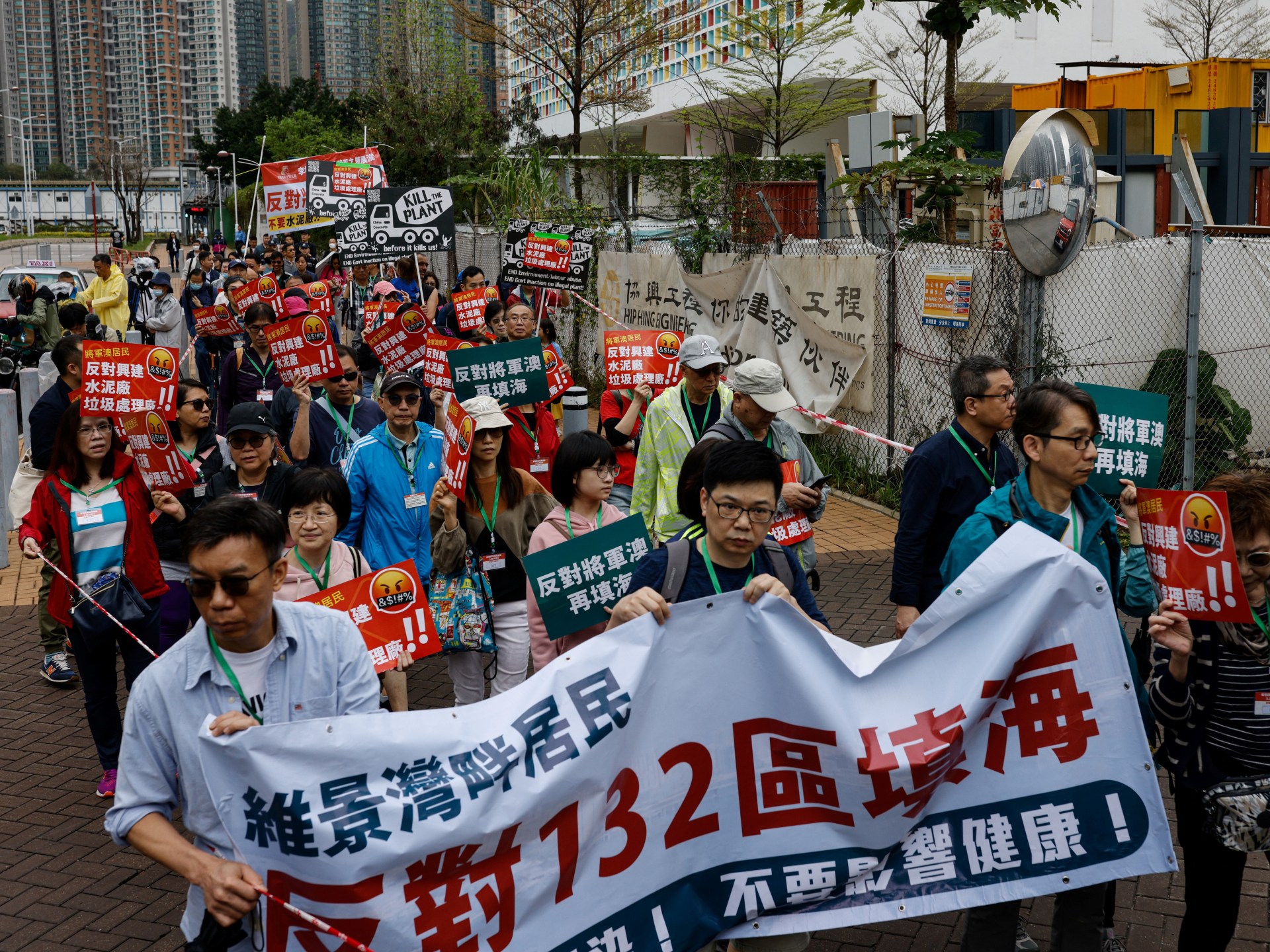 Hong Kongers stage first authorized protest in years under strict police rules.
