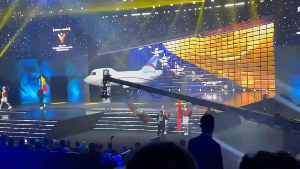 Featured image for Azerbaijan weightlifters depart Armenia following flag burning incident.