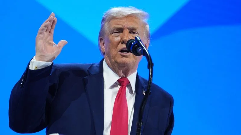 Trump touts wealth boon for elites at Davos, drawing critics