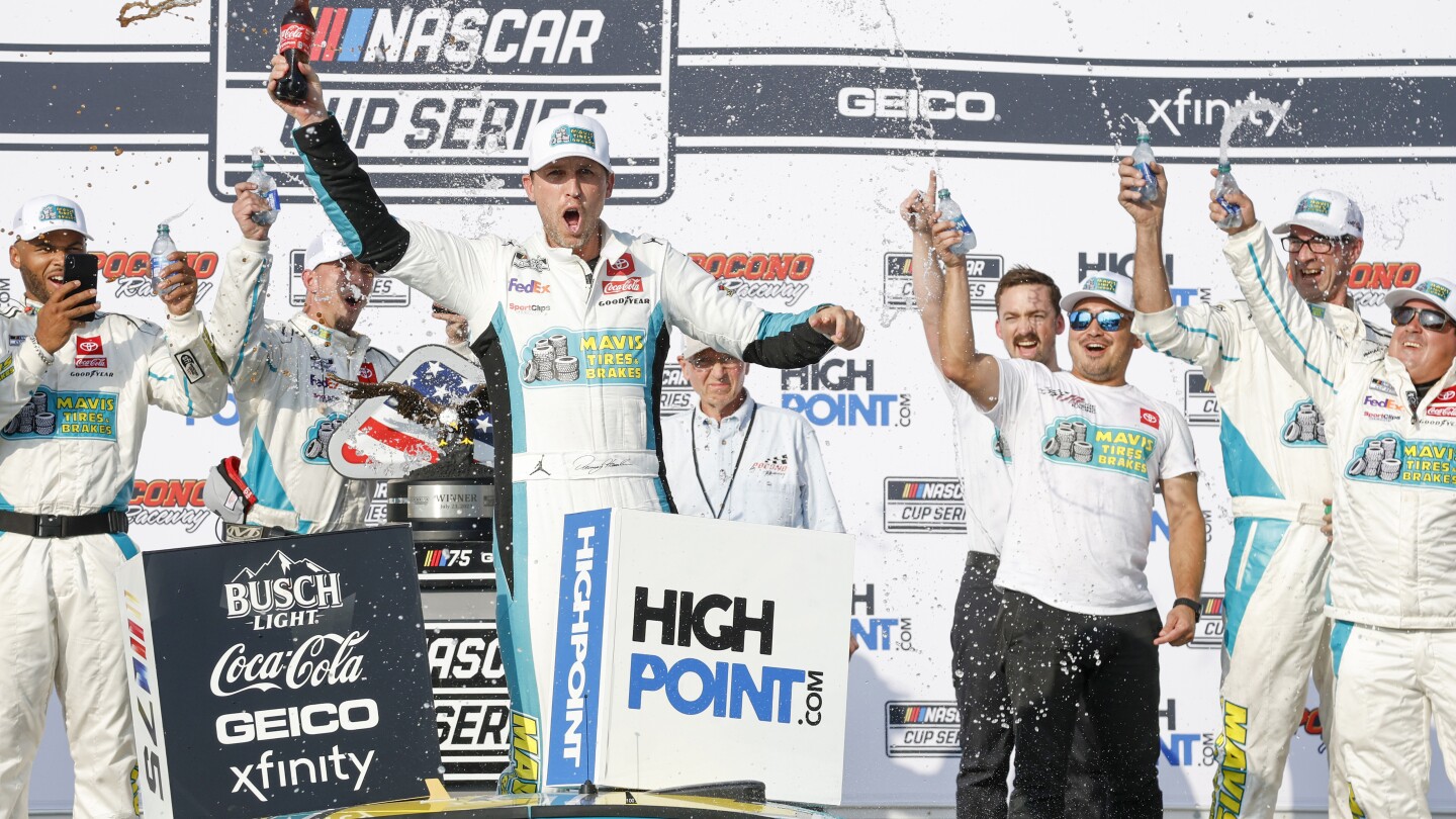 "Controversy and Triumph: Denny Hamlin Dominates Pocono Raceway"