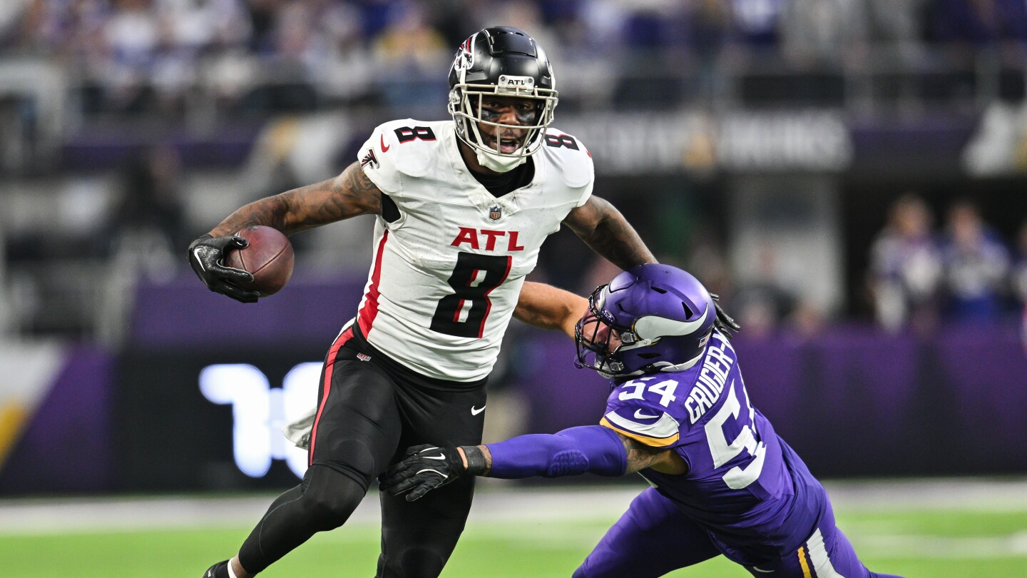 Featured image for Falcons' OTAs Begin Without Key Players Kyle Pitts and Kirk Cousins