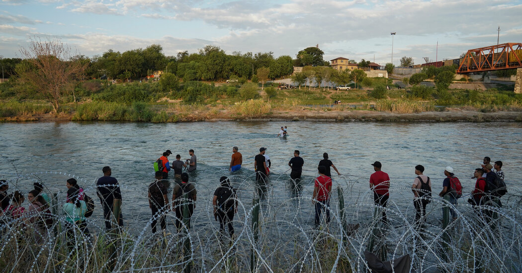 Abbott Calls for Arrest of 50,000 Bused Migrants in Texas