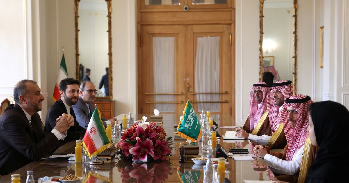 Saudi and Iranian foreign ministers meet in Tehran to restore ties.