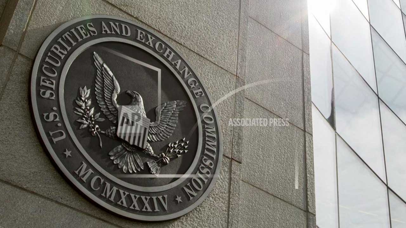 "Man Pleads Guilty to Insider Trading by Eavesdropping on Wife's Work Conversations"