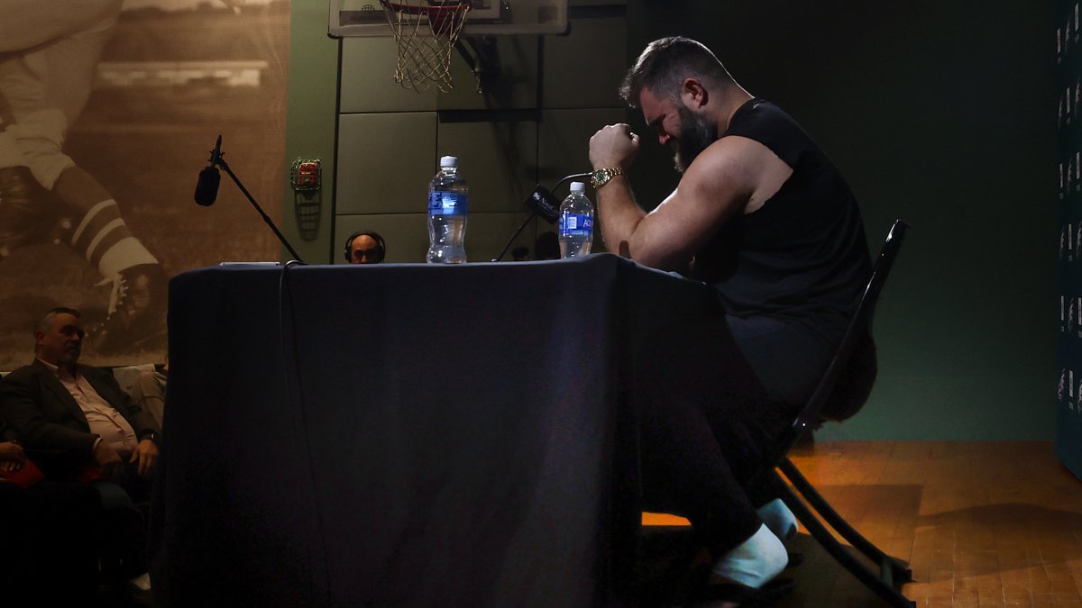 "Jason Kelce's Emotional Retirement Speech: The Meaning Behind His Taped Ankles"