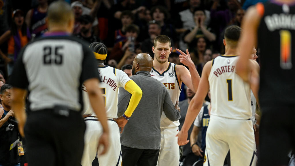 Nikola Jokic fined for pushing Suns owner during game.