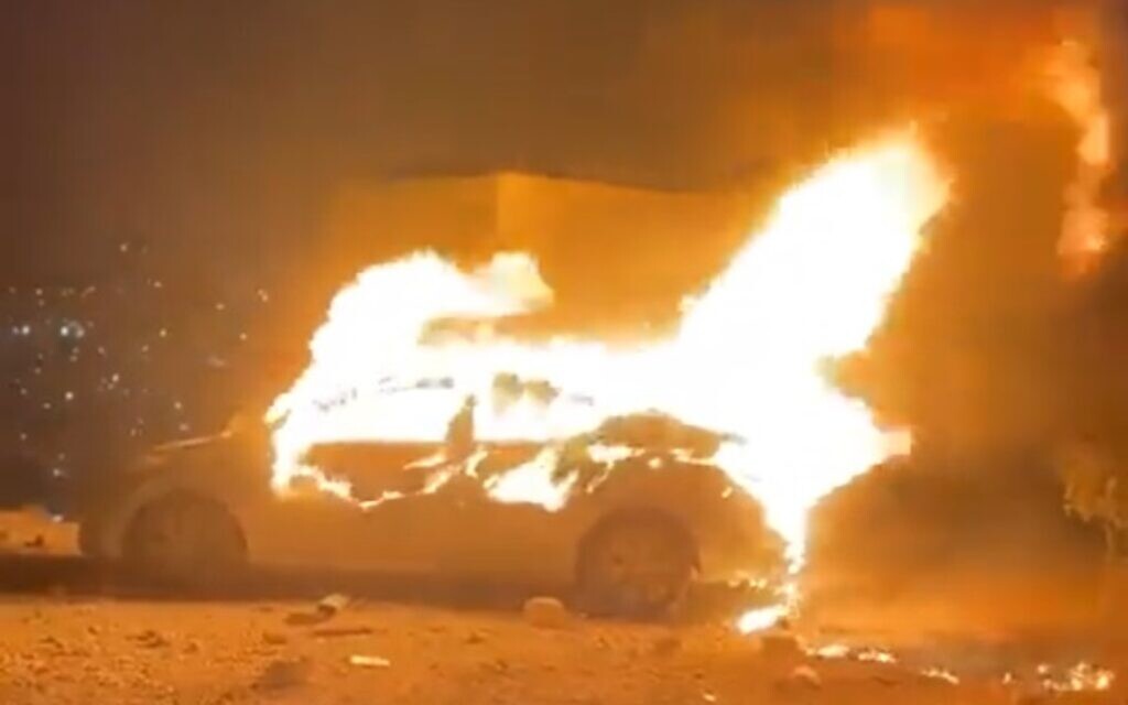 Israeli Man Mistakenly Enters Palestinian Town, Car Torched, Rescued with Minor Injuries