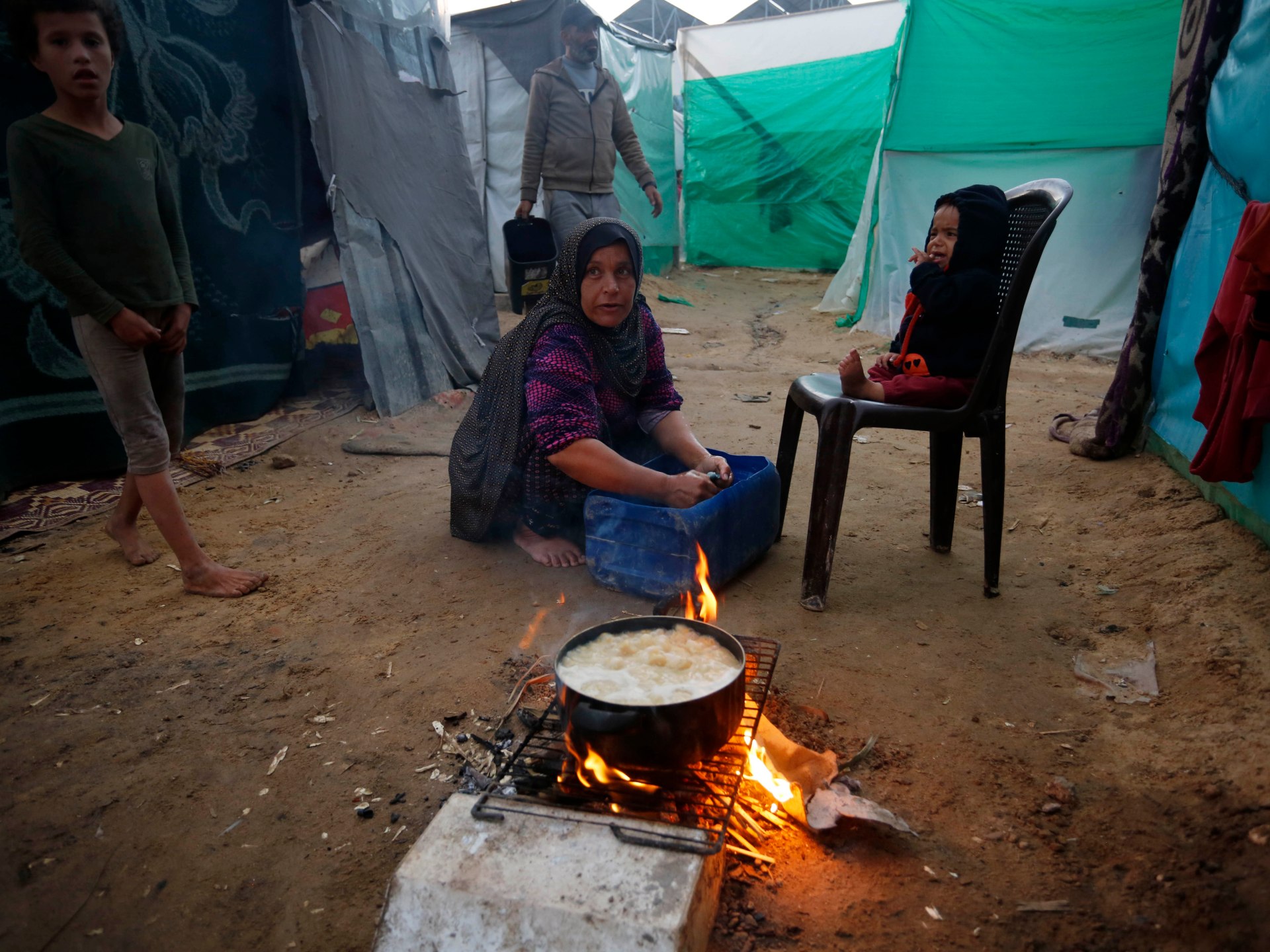 "Israel-Hamas Conflict: Gaza Aid Scramble Amid Rising Hunger and Deadly Maze"