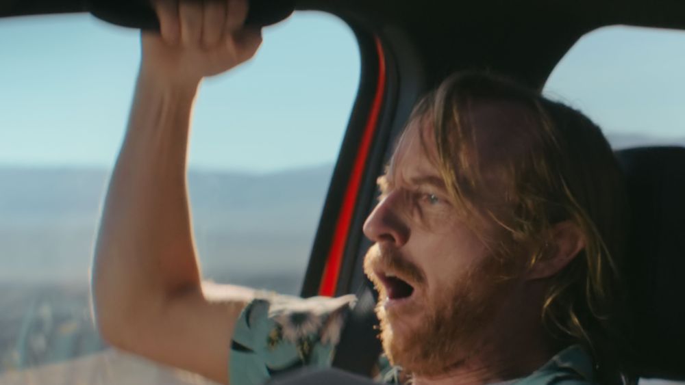 "2024 Toyota Super Bowl Ad: Car Challenges Over Famous Faces"
