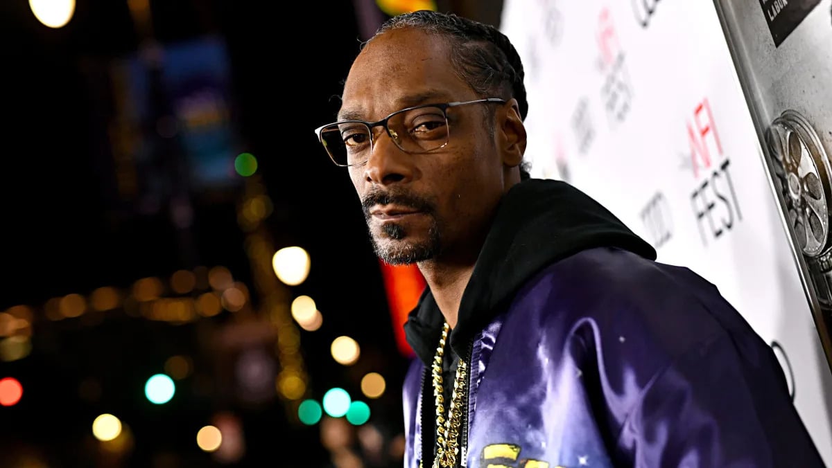 Featured image for "Snoop Dogg Faces Backlash for Smoking Weed Around Grandchildren"