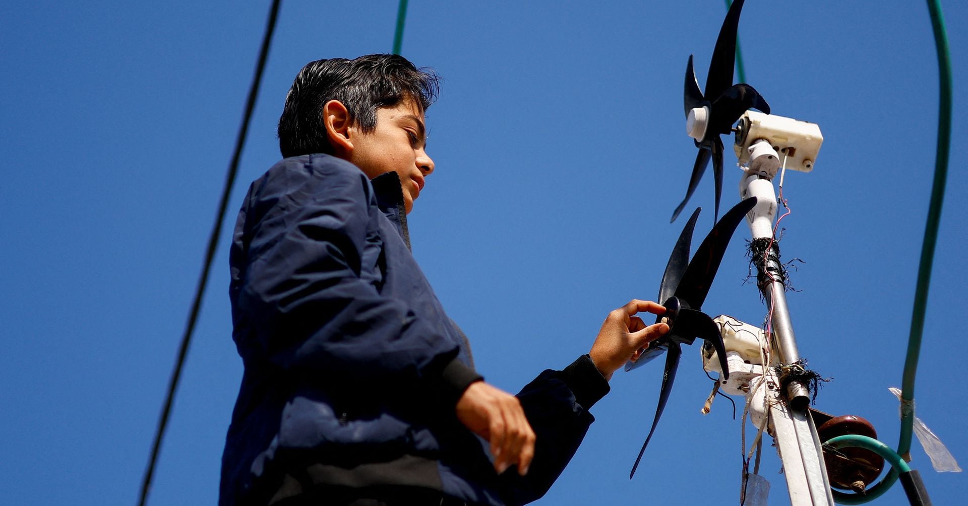 "Teenage Innovator Creates Solar-Powered Lighting System for Family Tent"