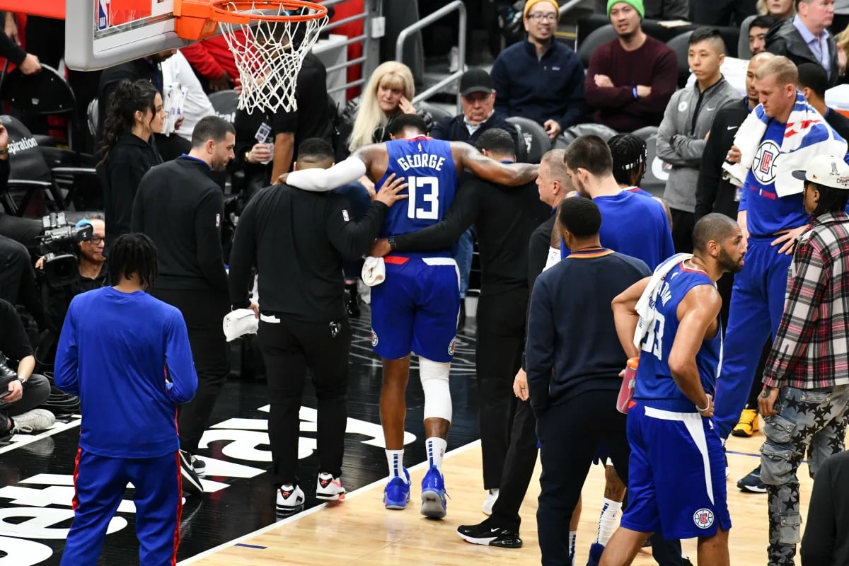 Paul George's 360 Dunk overshadowed by apparent leg injury in Clippers' loss.