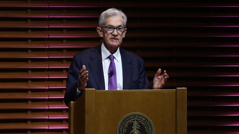 "Powell Signals Delay in Rate Cuts Amid Inflation Concerns"