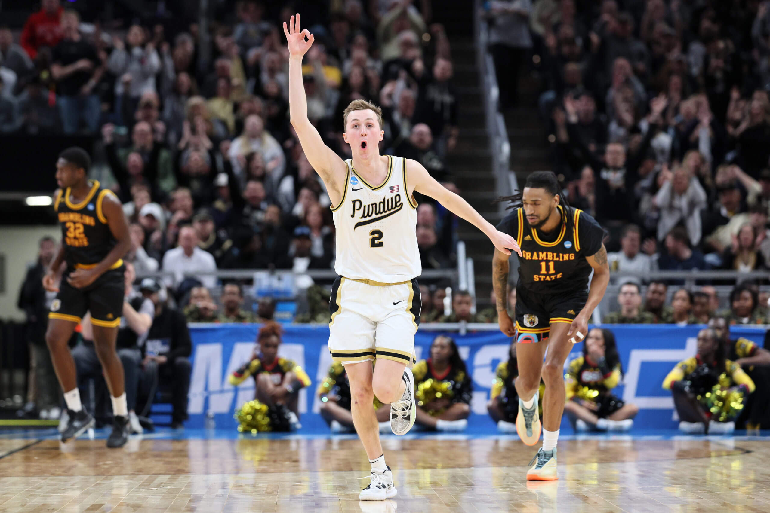 "Purdue's March Madness Redemption: Zach Edey Leads Team to First Round Victory"