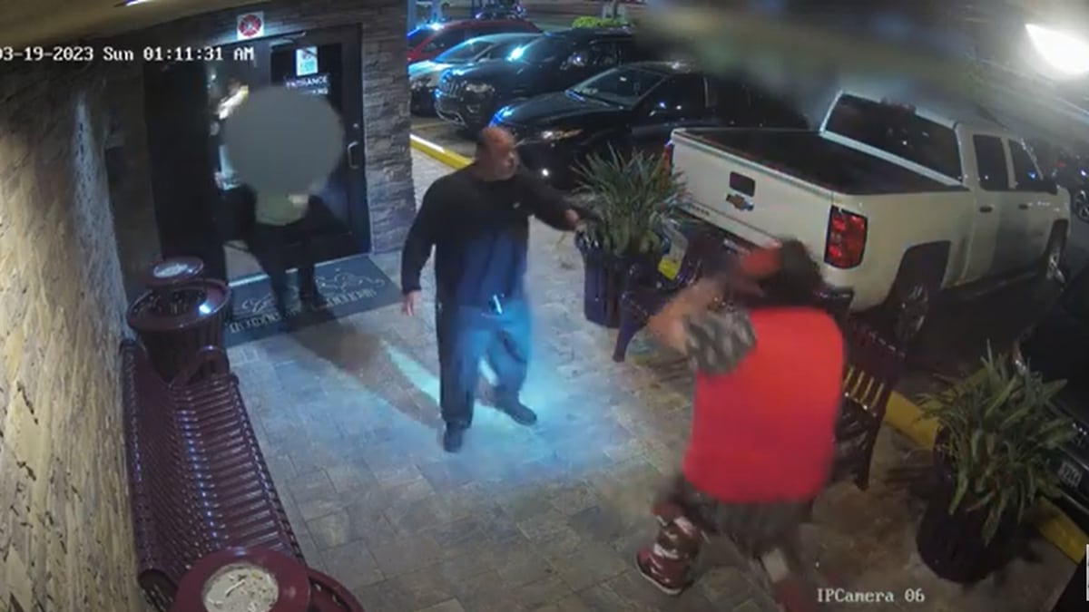 Strip club security guards thwart armed man in devil mask.
