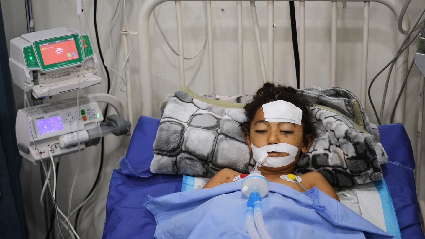 Featured image for Twin Boys Wounded by Bomb in Gaza's Rubble