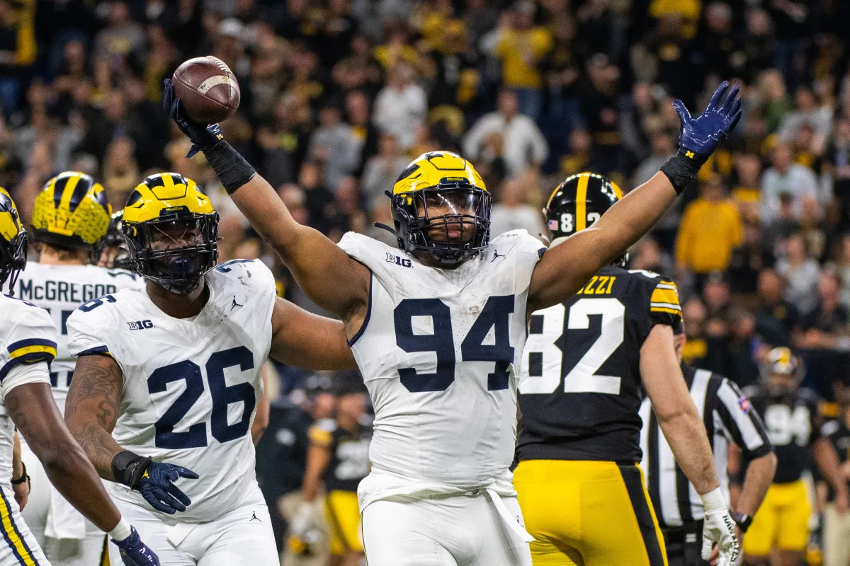 Michigan Dominates Iowa to Secure College Football Playoff Spot