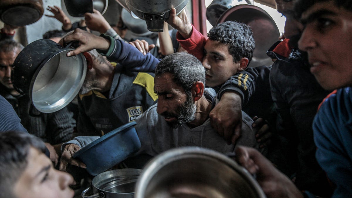 "Humanitarian Aid Efforts Escalate as Ships Head to Gaza Amid War and Famine Fears"