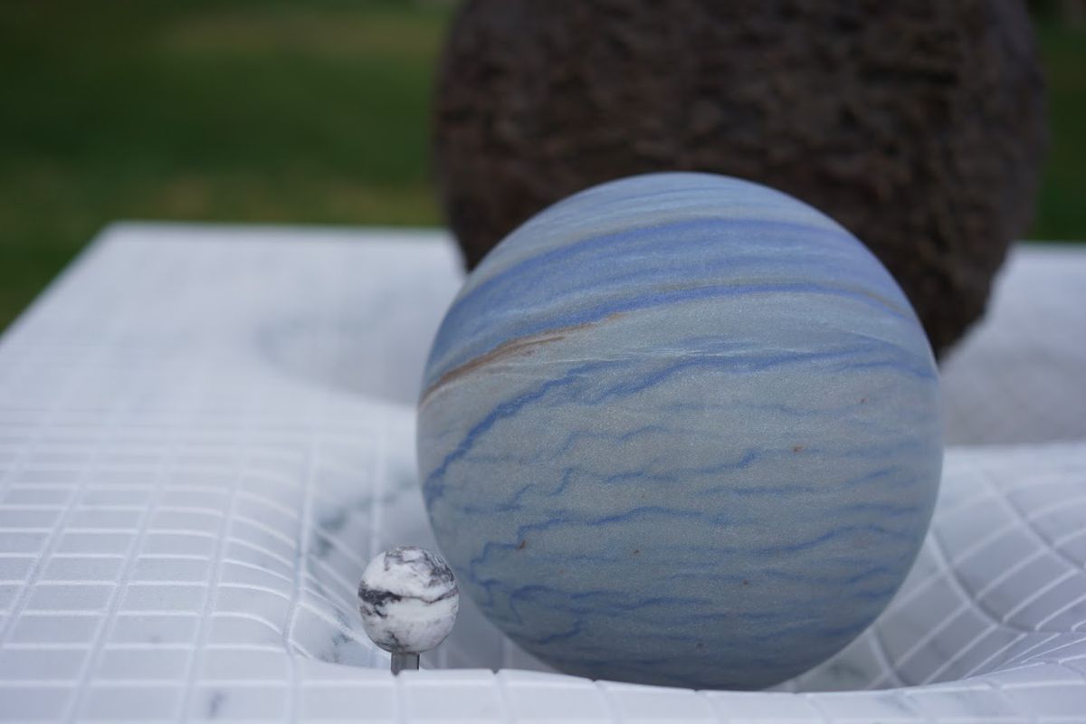 Unveiling the Mastermind Behind the Sculpted Fabric of Space and Time
