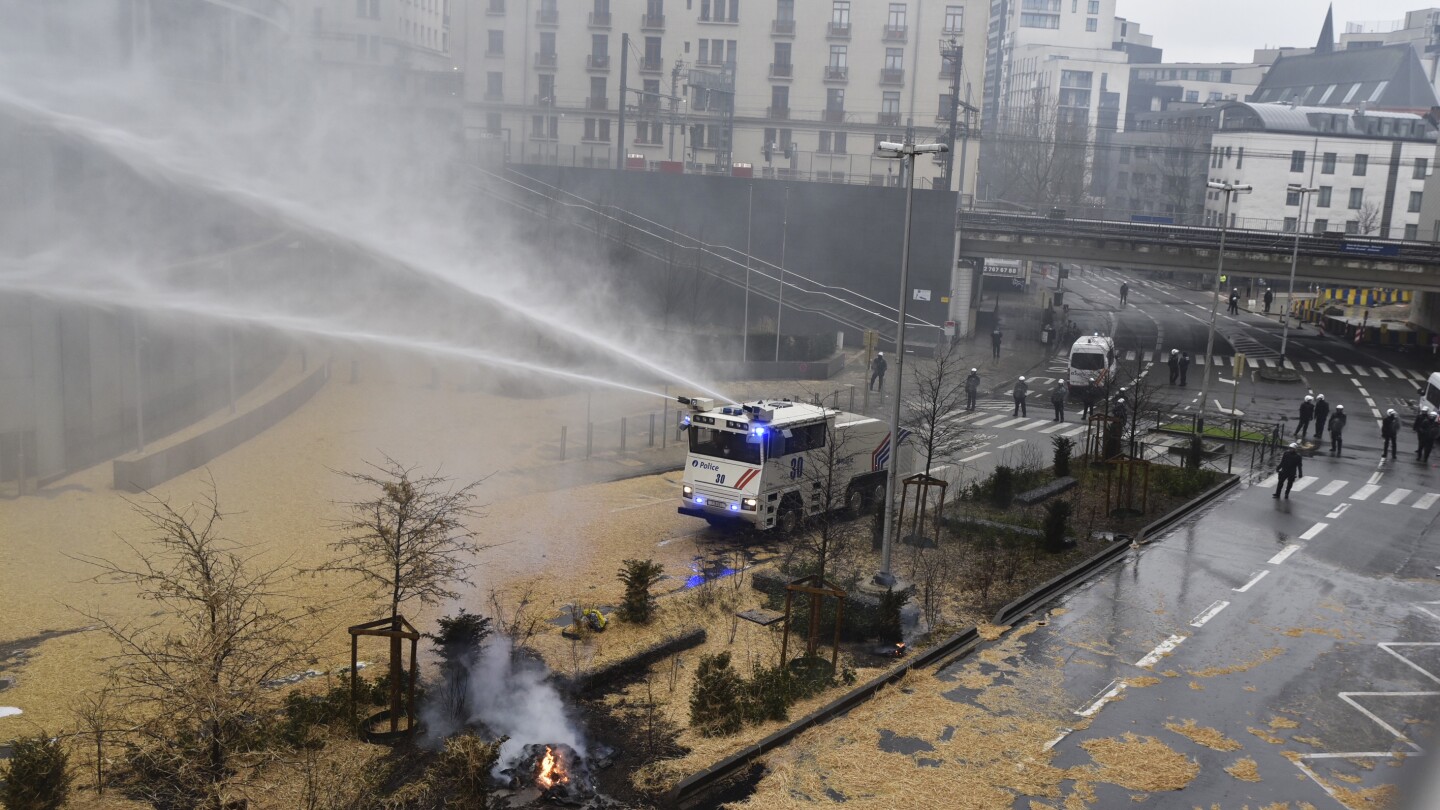 "European Farmers' Fiery Protest Sparks Clash with Police in Brussels"
