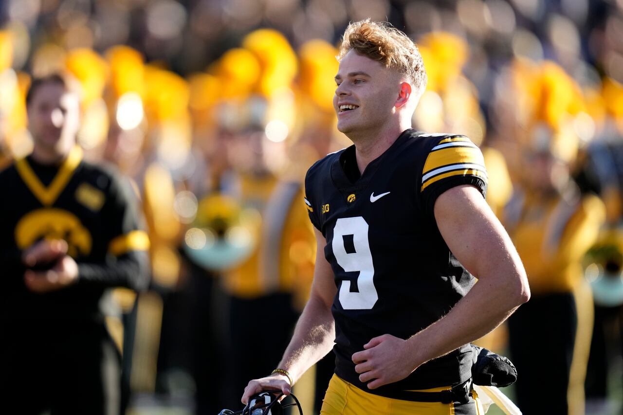 "Iowa's Tory Taylor Shatters 85-Year-Old NCAA Punting Record"