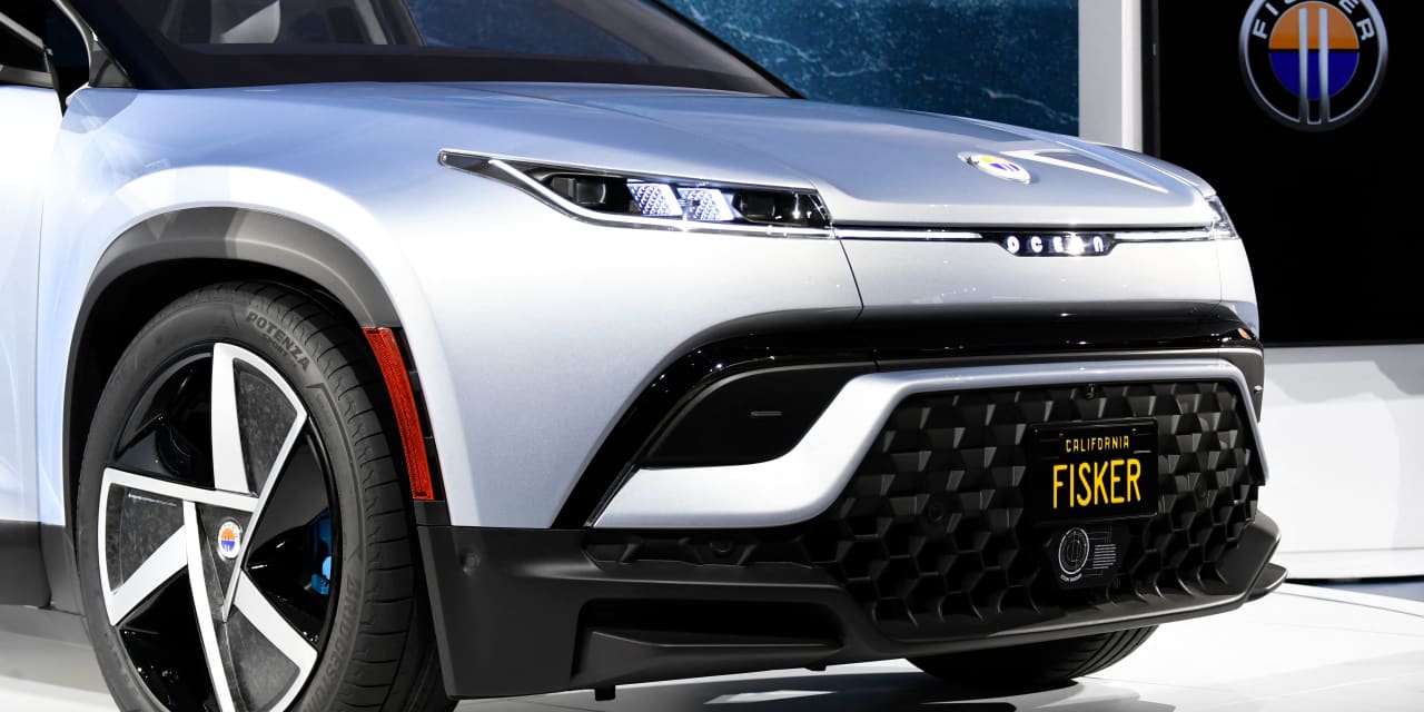 Featured image for Fisker's Production Forecast Cut Amid EV Startup Challenges.