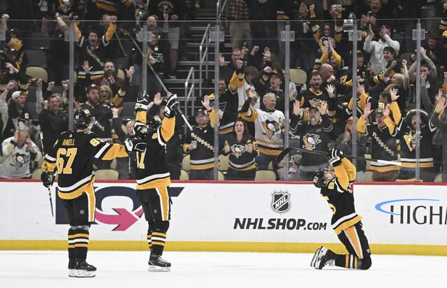 Featured image for "Penguins' Crosby and Karlsson Lead OT Victory with Milestone Performances"
