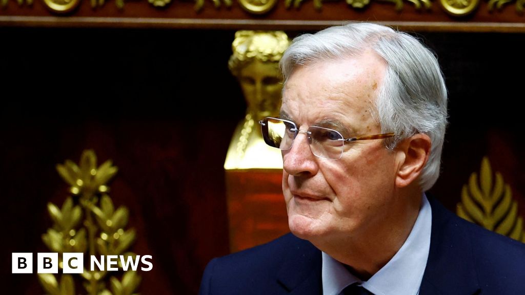 Featured image for French Government Faces No-Confidence Vote Amid Budget Clash with Le Pen