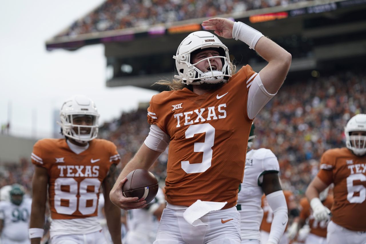 Longhorns' Ewers shines in spring game debut, Manning impresses as freshman QB.