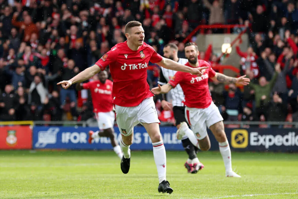 Ryan Reynolds witnesses Wrexham's thrilling victory over Notts County in National League promotion showdown.