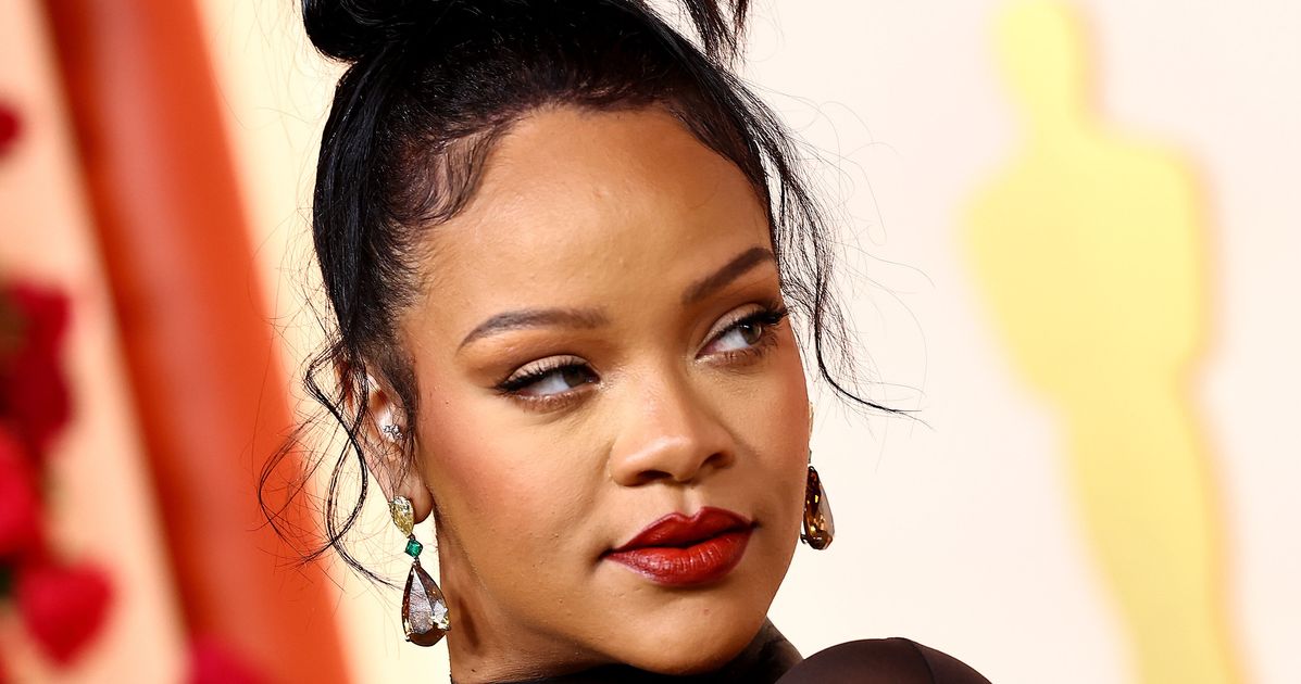 Featured image for Rihanna's 'Use a Condom' Tee Sparks Approval and Laughter on Twitter.