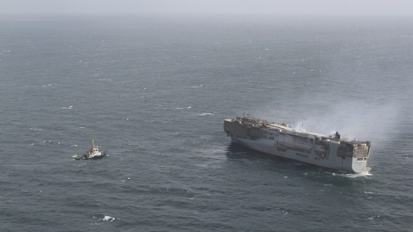 Featured image for "Burning cargo ship relocated off Dutch coast as salvage crews take action"
