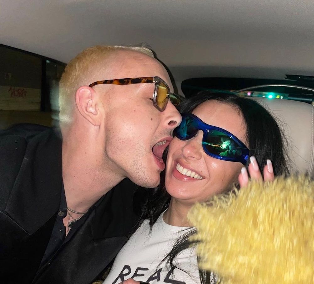 "Pop Stars Charli XCX and George Daniel of The 1975 Announce Engagement"