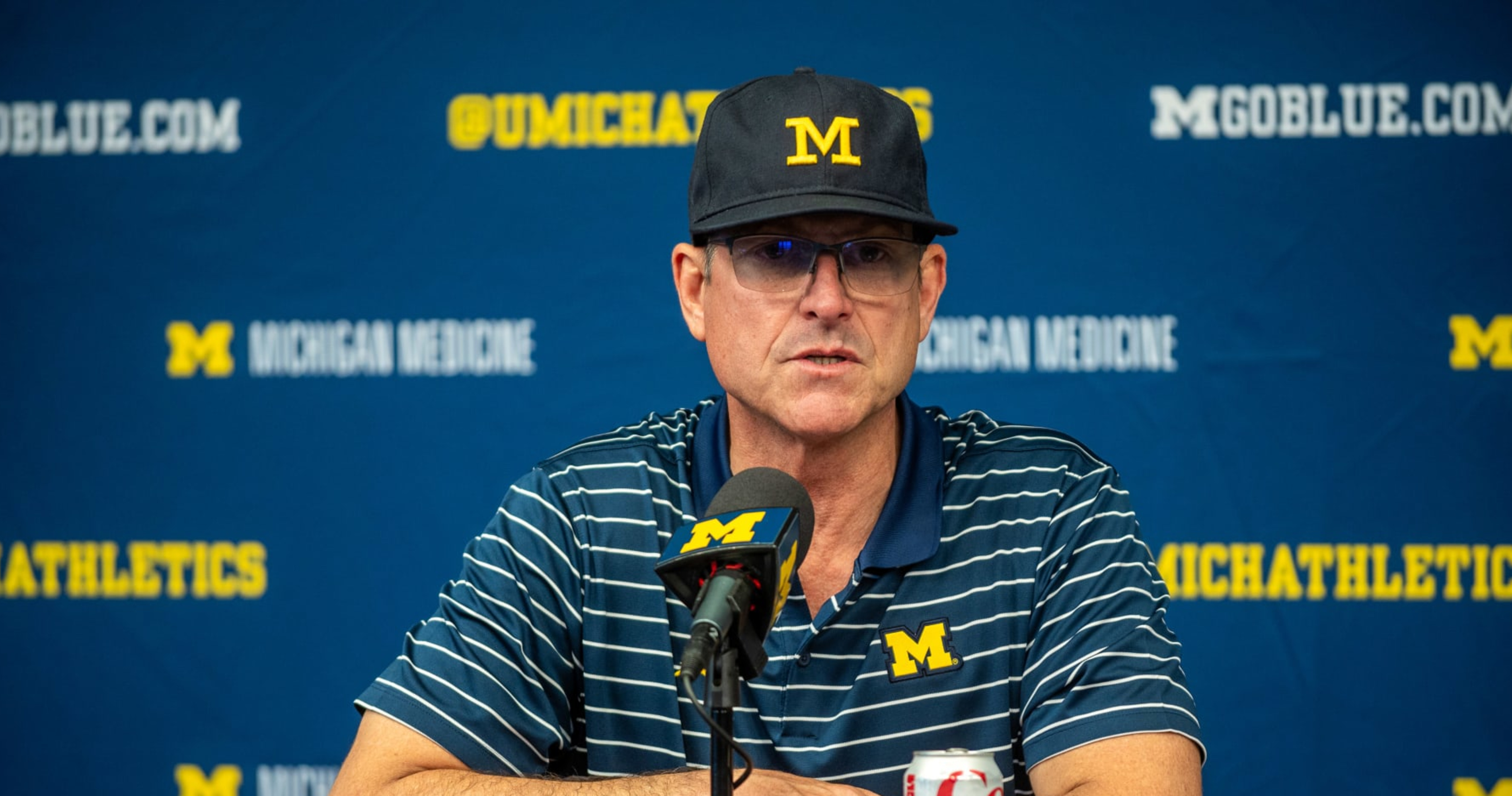 "Michigan's Jim Harbaugh Faces Potential Fine and Disqualification Amid Sign-Stealing Scandal"