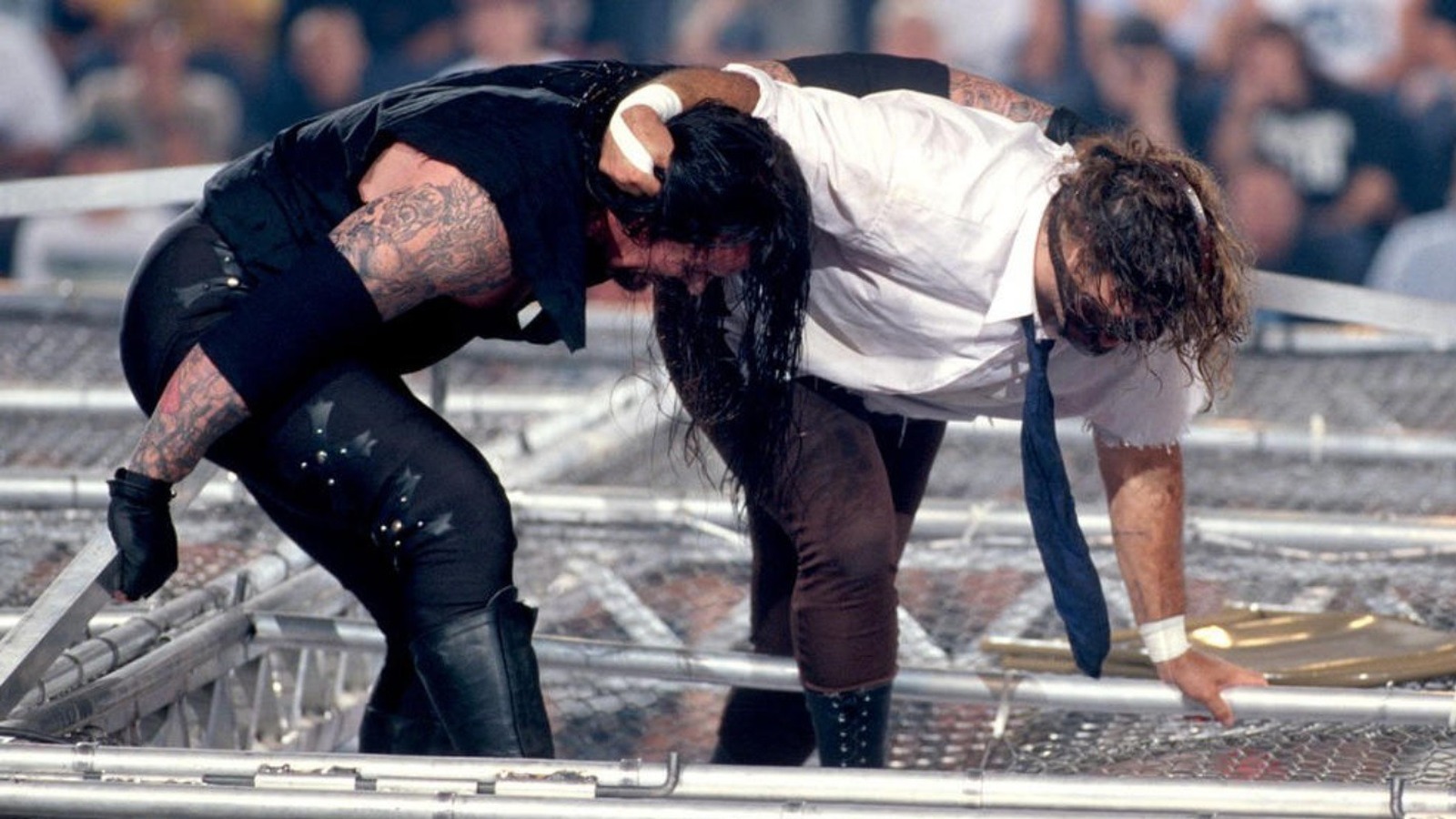 Featured image for Mick Foley Recalls Original Plans and Legacy of WWE's Hell in a Cell Match