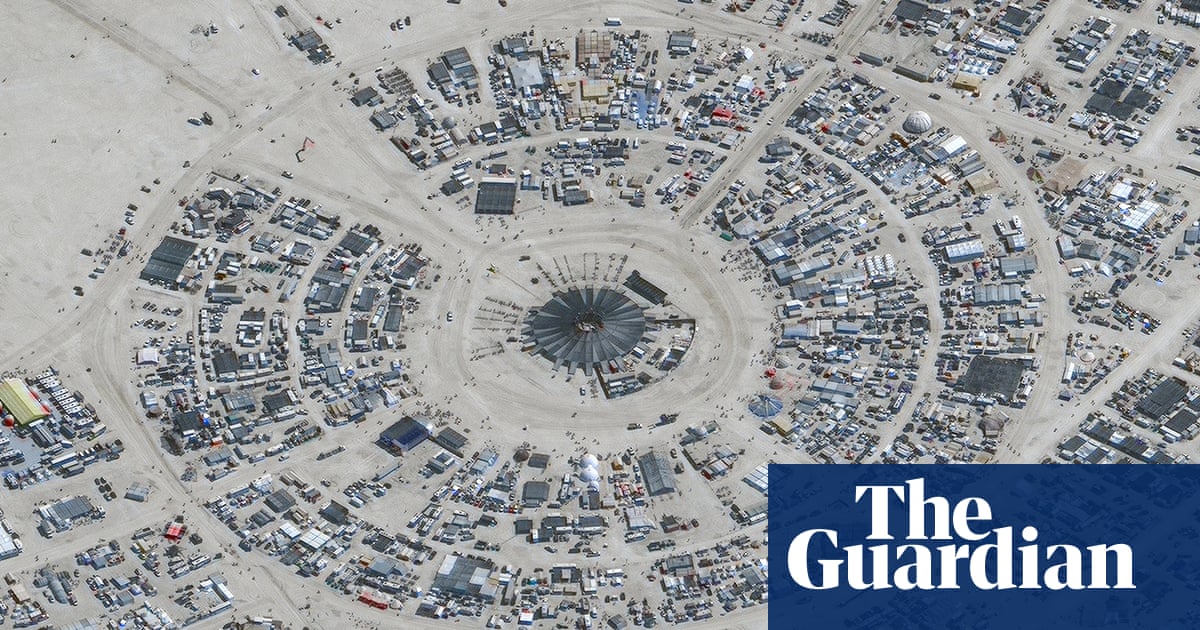 Featured image for Rainstorm at Burning Man festival leaves attendees stranded in muddy desert