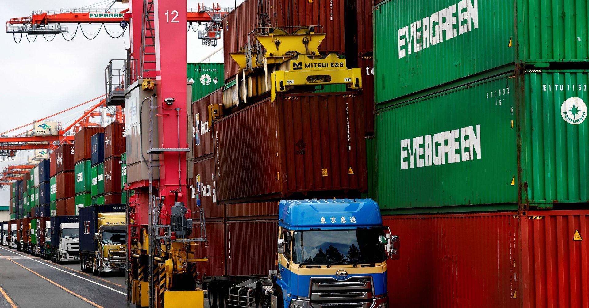 "Japan's Economy Grows, Avoids Recession as BOJ Considers Positive Rates"
