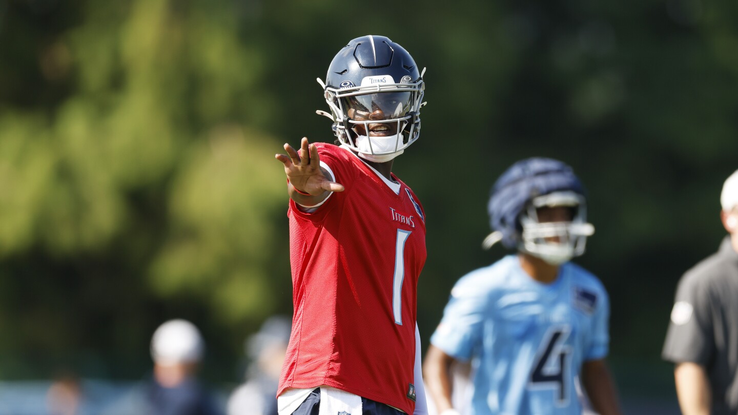 Featured image for Titans Rookie Cam Ward Faces Challenges and Scrutiny in First Training Camp