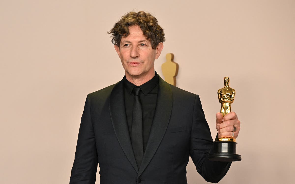 Featured image for "Controversy at the Oscars: Jonathan Glazer's Speech and the Meaning of Red Pins"
