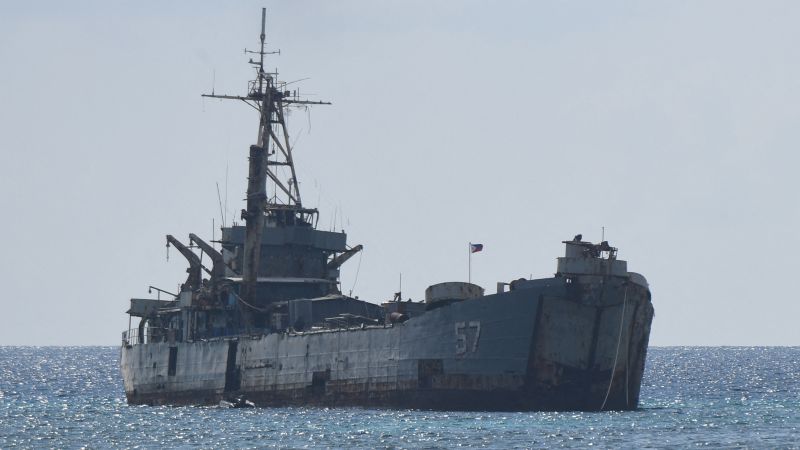 "Philippines Reports Chinese Vessels Firing Water Cannon in South China Sea Confrontation"