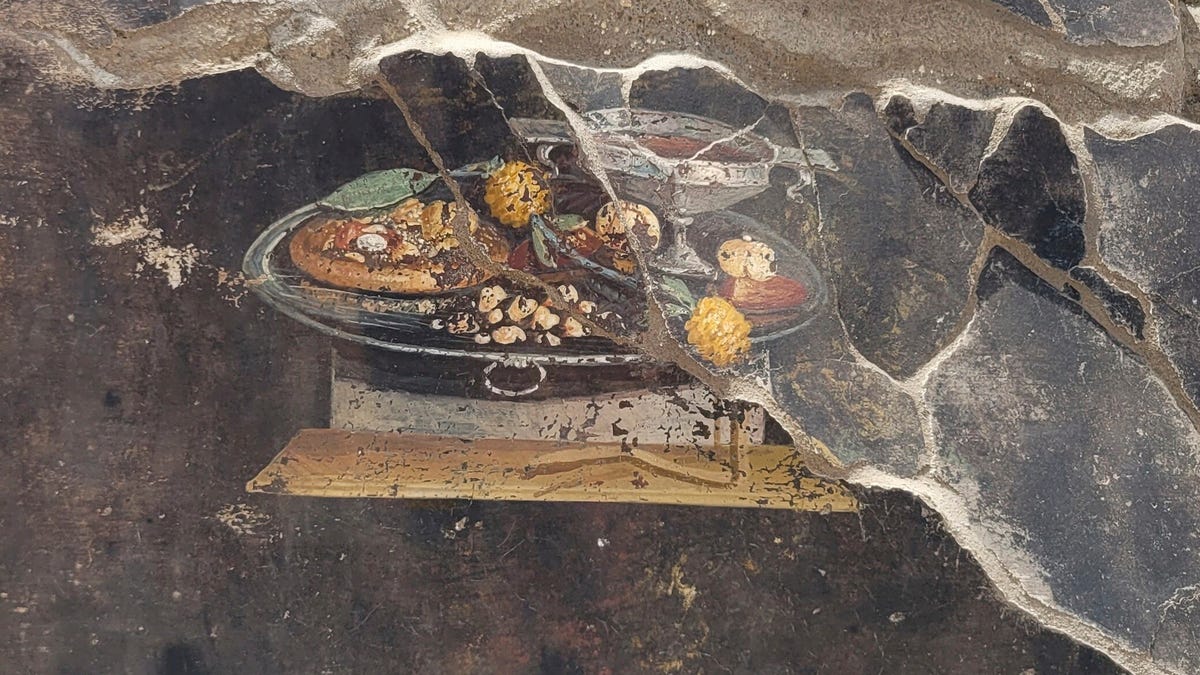 "Pompeii's Ancient Pizza: Unveiling the Proto-Pizza Fresco"