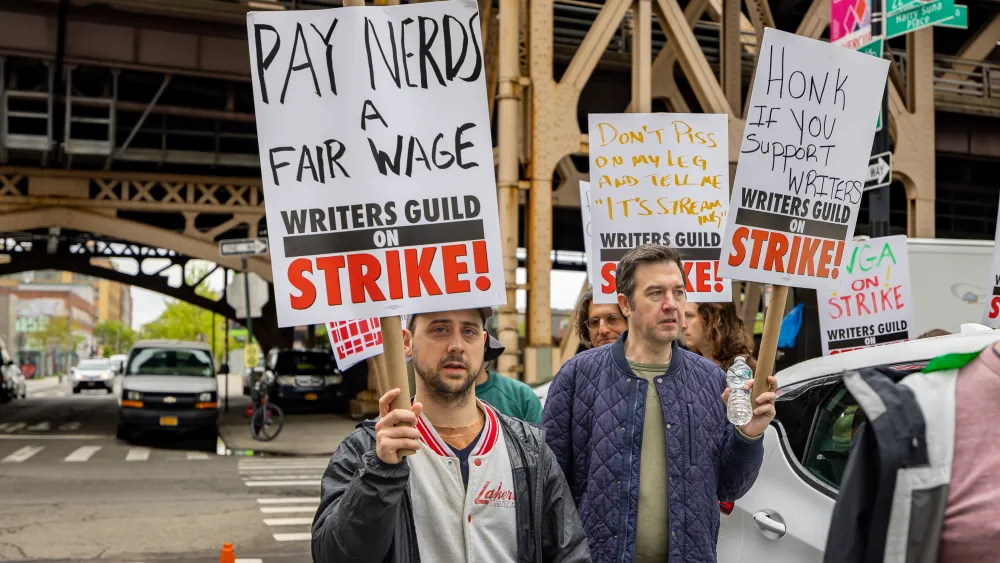Featured image for Hollywood CEOs and Writers Guild Continue Talks to End Strike