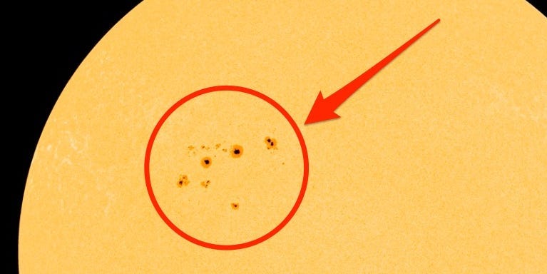 "Massive Sunspot Cluster Threatens Earth with Powerful Solar Storms"