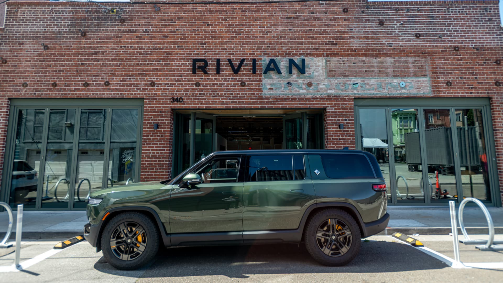 Featured image for Rivian to Lay Off Over 600 Employees Amid EV Market Challenges